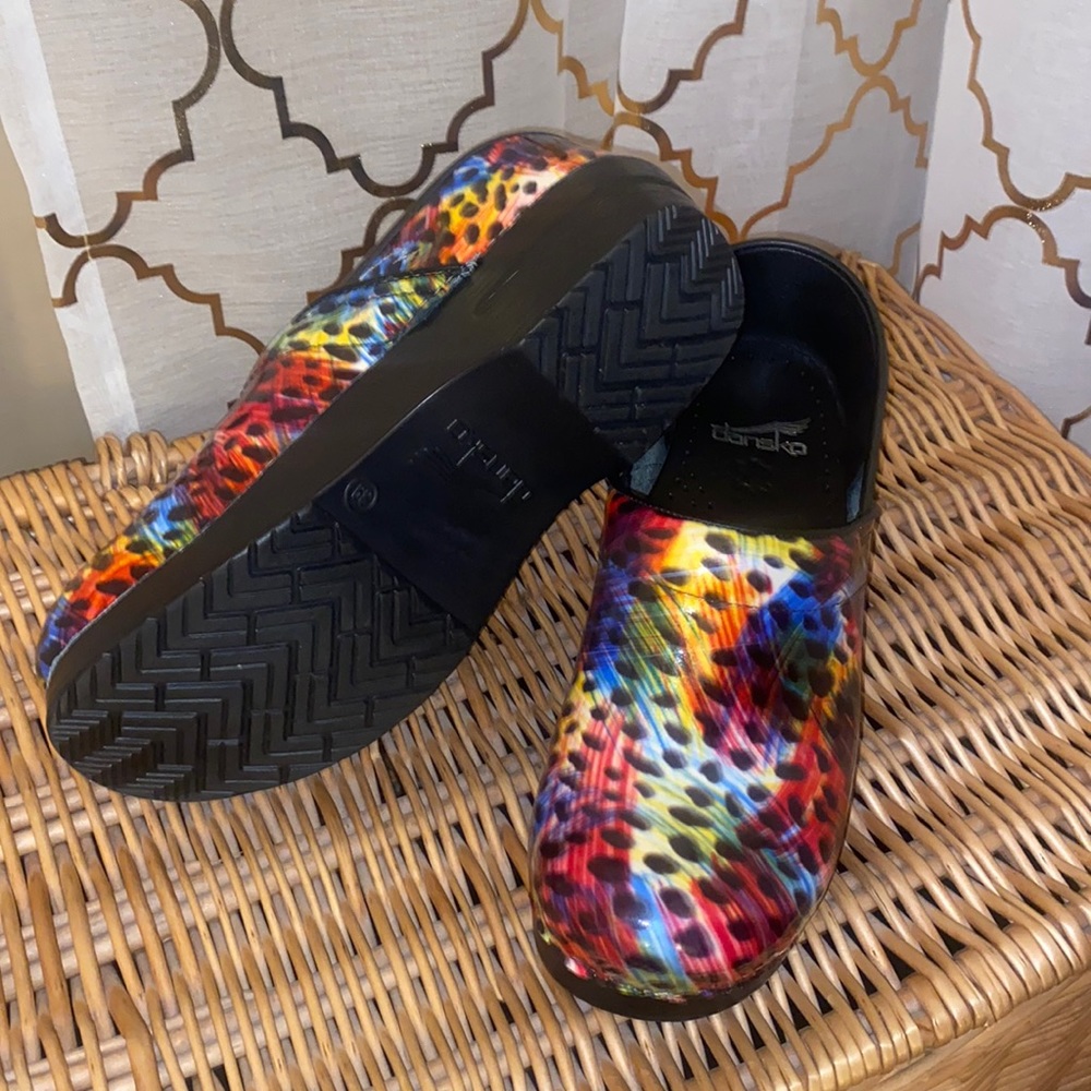 Dansko animal print clog. Never worn. Women’s UK size 39 and US size 8.